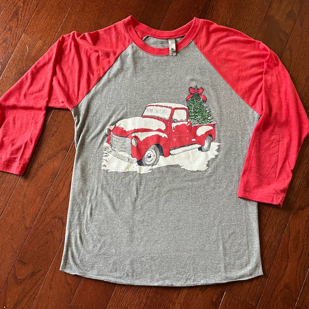 Christmas themed baseball style tee shirt.